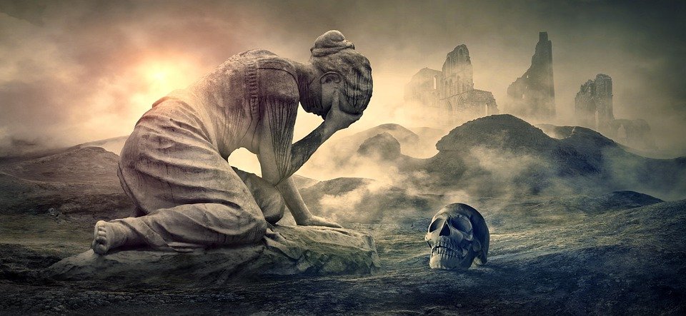 ePrivacy Directive and GDPRmageddon: stone figure kneeling in a gloomy landscape of ruins