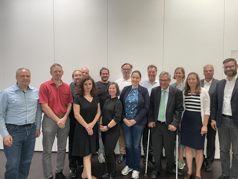 AI training and GDPR: group photo of the AI expert group in a meeting room
